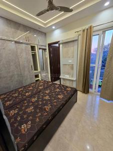 Bedroom Image of 900 Sq.ft 2 BHK Builder Floor for rent in Rajouri Garden New Delhi for Rs. 40000