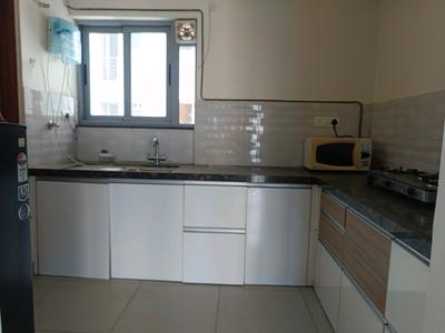 Kitchen Image of 1000 Sq.ft 2 BHK Apartment / Flat for sale in Amanora Neo Towers, Amanora Park Town Pune for Rs. 14850000
