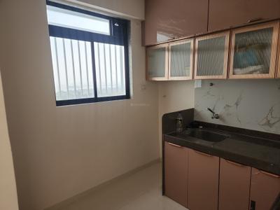 Kitchen Image of 777 Sq.ft 1 BHK Apartment / Flat for rent in Earth Anand, Mandvi Mumbai for Rs. 60000