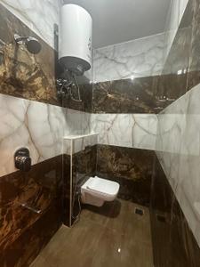 Bathroom Image of 1200 Sq.ft 2 BHK Independent House for rent in Aduru Bengaluru for Rs. 25000