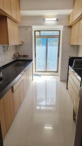 Kitchen Image of 902 Sq.ft 3 BHK Apartment / Flat for sale in Kumar Court, Santacruz East Mumbai for Rs. 29900000