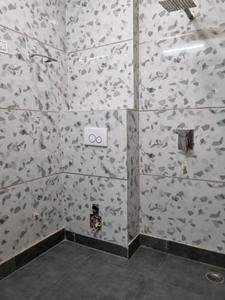 Common Bathroom Image of 900 Sq.ft 3 BHK Apartment / Flat for sale in Hans Builders Floor, Dwarka Mor New Delhi for Rs. 5900000