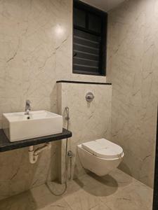 Common Bathroom Image of 1311 Sq.ft 2 BHK Apartment / Flat for sale in Kharadi Pune for Rs. 12000000