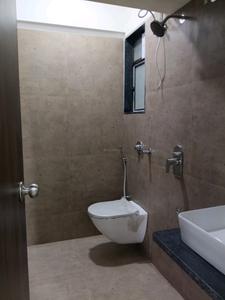 Common Bathroom Image of 550 Sq.ft 1 BHK Apartment / Flat for sale in Unique Elanza, Mira Road East Mira Bhayandar for Rs. 5500000