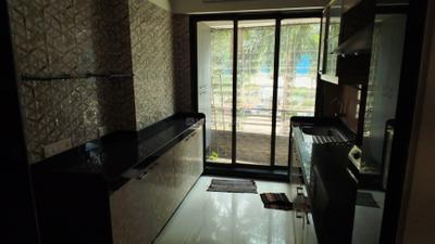 Kitchen Image of 950 Sq.ft 2 BHK Apartment / Flat for rent in Kandivali West Mumbai for Rs. 70000