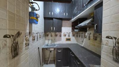 Kitchen Image of 980 Sq.ft 2 BHK Apartment / Flat for rent in Pitampura New Delhi for Rs. 24000
