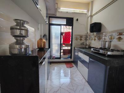 Kitchen Image of 640 Sq.ft 1 BHK Apartment / Flat for sale in Satllaj Residency, Kamothe Navi Mumbai for Rs. 5600000