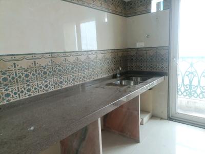 Kitchen Image of 715 Sq.ft 1 BHK Apartment / Flat for sale in Metro Satyam Queens Necklace, Taloja Navi Mumbai for Rs. 4200000