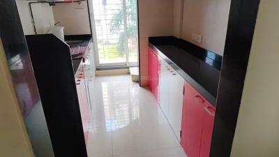 Kitchen Image of 1135 Sq.ft 2 BHK Apartment / Flat for sale in Tharwani Residency, Kamothe Navi Mumbai for Rs. 12000000
