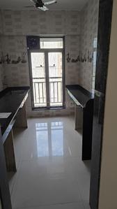 Kitchen Image of 1090 Sq.ft 2 BHK Apartment / Flat for rent in National Trinity Paradise Phase 1, Shilphata Thane for Rs. 17500
