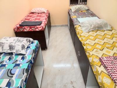 Bedroom Image of Senthil Kumarar Womens Hostel in Nazarathpettai, Thiruvallur, Chennai