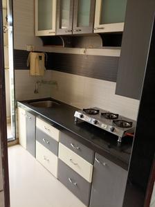 Kitchen Image of 680 Sq.ft 1 BHK Apartment / Flat for rent in Devesh Osho Purshottam, Kamothe Navi Mumbai for Rs. 25000