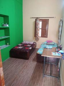 Bedroom Image of Shreya pg in Laxman Chowk, Dehradun