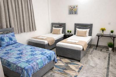 Bedroom Image of Ab Hospitality in Sector 51, Noida