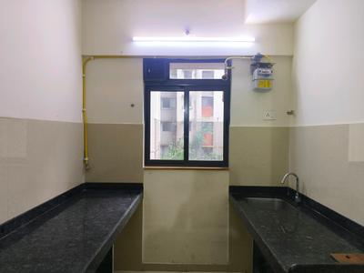 Kitchen Image of 876 Sq.ft 1 BHK Apartment / Flat for rent in Lodha Palava Downtown, Palava Phase 2 Thane for Rs. 15000