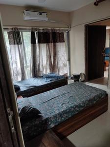 Bedroom Image of Durga Paying Guest in Malad East, Mumbai