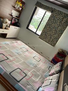 Bedroom Image of 850 Sq.ft 2 BHK Apartment / Flat for rent in Ayushyaman Elegance, Ghatlodiya Ahmedabad for Rs. 25000