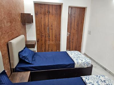 Bedroom Image of Sharma Boys Pg in Ashok Vihar, New Delhi