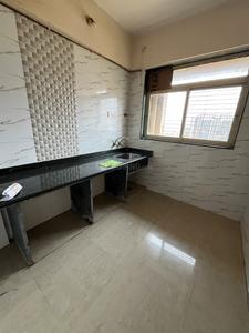 Kitchen Image of 700 Sq.ft 1 BHK Apartment / Flat for sale in Mohan Willows I, Badlapur East Badlapur for Rs. 2750000