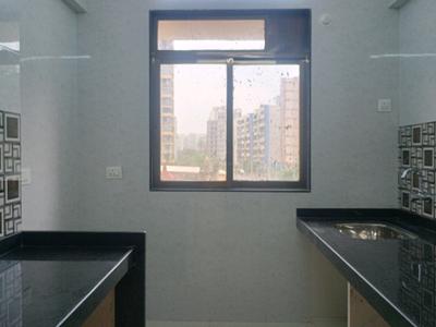 Kitchen Image of 586 Sq.ft 1 BHK Apartment / Flat for sale in Tharwani Vedant Millenia, Titwala Thane for Rs. 2850000