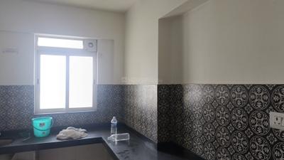 Kitchen Image of 915 Sq.ft 1 BHK Apartment / Flat for rent in Lodha Amara, Kolshet Thane for Rs. 45000