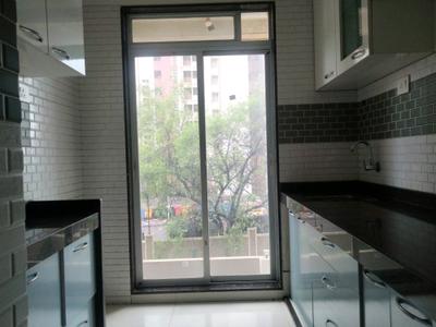 Kitchen Image of 700 Sq.ft 1 BHK Apartment / Flat for sale in Niharika Absolute, Kharghar Navi Mumbai for Rs. 6000000