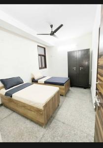 Bedroom Image of Apna niwas pg in Sector 126, Noida