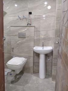 Common Bathroom Image of 900 Sq.ft 2 BHK Builder Floor for rent in Rajpur Khurd Village New Delhi for Rs. 20000