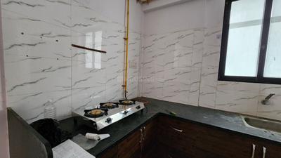 Kitchen Image of 1450 Sq.ft 3 BHK Apartment / Flat for rent in Sargasan Gandhinagar for Rs. 27000