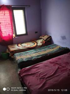 Bedroom Image of Mahajan Hostel in Karve Nagar, Pune