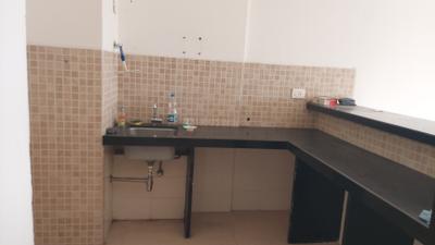 Kitchen Image of 640 Sq.ft 1 RK Studio for rent in Lodha Belmondo, Gahunje Pune for Rs. 25500