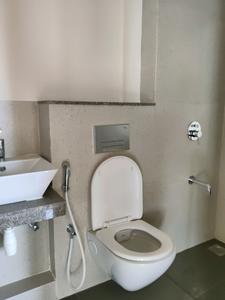 Common Bathroom Image of 550 Sq.ft 2 BHK Apartment / Flat for sale in Piramal Vaikunth, Thane West Thane for Rs. 10900000