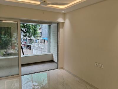 Living Room Image of 530 Sq.ft 1 BHK Apartment / Flat for sale in Ajmera Bhakti Park, Wadala East Mumbai for Rs. 11000000