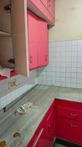 Kitchen Image of 950 Sq.ft 2 BHK Apartment / Flat for sale in Co Ayodhya Enclave CHS, Sector 13 Rohini New Delhi for Rs. 16000000