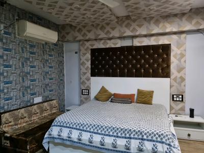 Bedroom Image of 1200 Sq.ft 2 BHK Builder Floor for rent in Janakpuri New Delhi for Rs. 26000