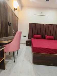 Bedroom Image of HelloWorld Electronic City in Sector 62, Noida