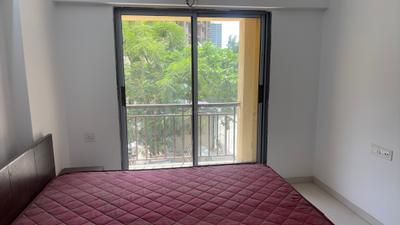Bedroom Image of 721 Sq.ft 1 BHK Apartment / Flat for rent in Cosmos Meluha, Khidkali Thane for Rs. 12500