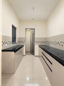 Kitchen Image of 580 Sq.ft 1 BHK Apartment / Flat for sale in Mahindra Happinest Tathawade, Tathawade Pune for Rs. 5500000