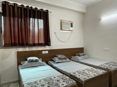 Bedroom Image of Vizima Boys PG in Sector 128, Noida