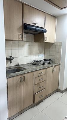 Kitchen Image of 671 Sq.ft 1 RK Studio for rent in Assotech Cabana, Indirapuram Ghaziabad for Rs. 25500
