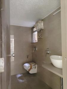 Common Bathroom Image of 800 Sq.ft 2 BHK Apartment / Flat for sale in Mansarovar Pearl Gardens, Vasai West Vasai for Rs. 6400000