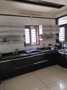 Kitchen Image of 2023 Sq.ft 4 BHK Villa for rent in AL Aamrakunj Lakeview Bungalows, Chandkheda Ahmedabad for Rs. 70000