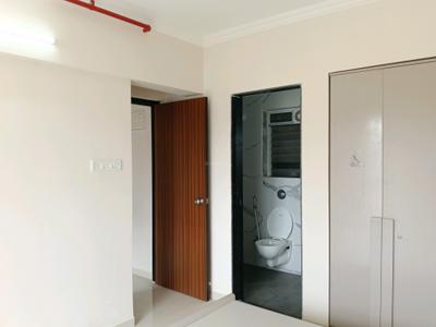 Bedroom Image of 630 Sq.ft 1 BHK Apartment / Flat for rent in Raunak Bliss Phase A, Kasarvadavali Thane for Rs. 23000