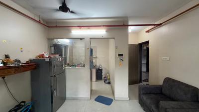 Living Room Image of 708 Sq.ft 1 BHK Apartment / Flat for sale in Dosti West County Dosti Nest Phase 1, Thane West Thane for Rs. 8500000