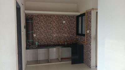 Kitchen Image of 750 Sq.ft 1 BHK Apartment / Flat for rent in Savani Developers Prayosha Home, Karadva Gam Surat for Rs. 8000