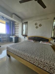 Bedroom Image of 950 Sq.ft 1 BHK Apartment / Flat for rent in Mangla Aura, Alkapuri Vadodara for Rs. 18000