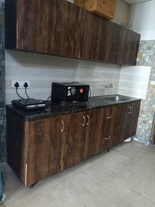 Kitchen Image of 450 Sq.ft Studio Studio for rent in Paramount Pine And Oak Studio, Surajpur Greater Noida for Rs. 15000