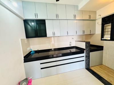 Kitchen Image of 650 Sq.ft 1 BHK Apartment / Flat for rent in Kohinoor Sportsville, Maan Pune for Rs. 28000