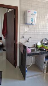 Kitchen Image of 547 Sq.ft 1 BHK Apartment / Flat for sale in Nirvana Wollywood Wada, Wada Mumbai for Rs. 3430000