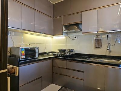 Kitchen Image of 910 Sq.ft 2 BHK Apartment / Flat for sale in Porwal Realtors Parklane Premier, Wagholi Pune for Rs. 6000000